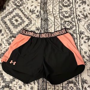 Under Armour pink and black athletic shorts